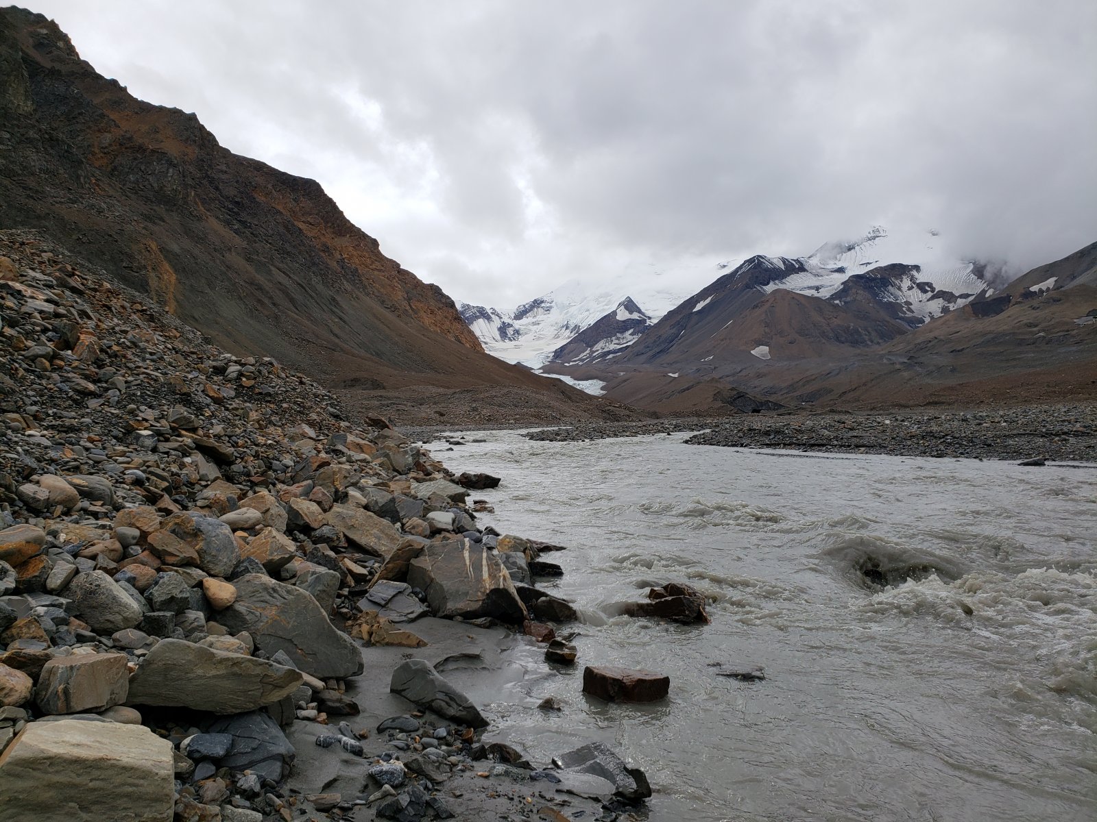 Even this far upriver where the water was much shallower, it was still 
moving quickly enough to sweep a person off their feet quite easily. The
 instability of the river bottom was only increased, as well.
