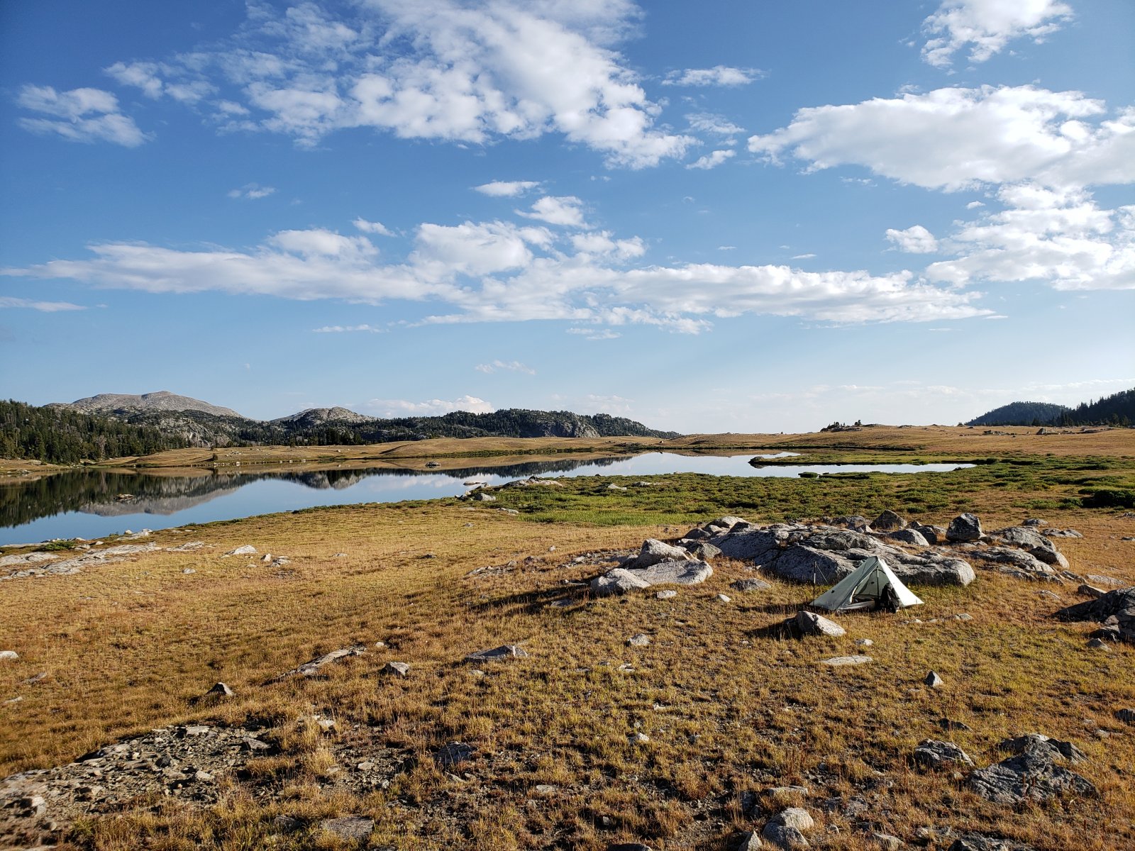 I really enjoyed my early camp at Summit Lake - there was only a small 
family of horsepackers on the opposite side of the lake. A small 
porcupine wandered around for over an hour, but somehow I never got a 
decent picture - it was nice to just watch.