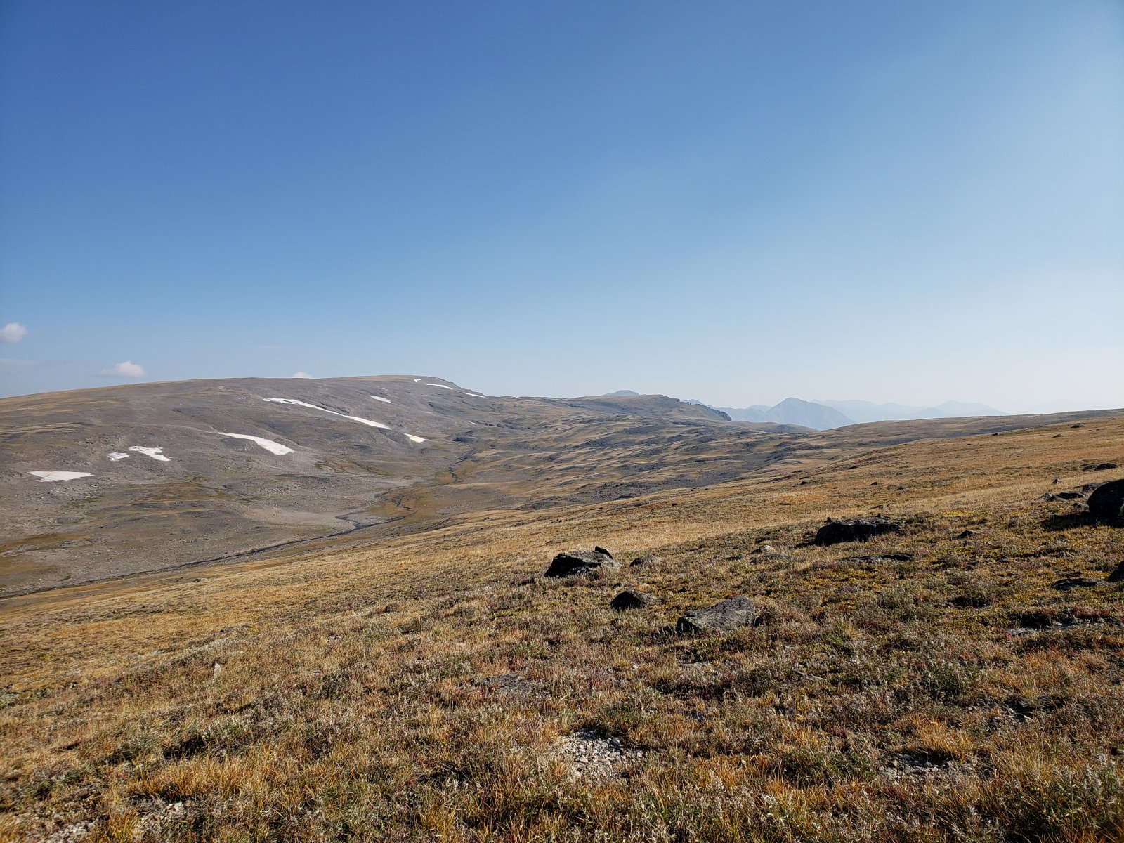 We found an enormous piece of petrified wood - we could trace it clearly
 up the hillside via smaller fragments to a sheer cliff. I did a little 
poking around for another large piece it could have separated from, but 
didn't have any luck.