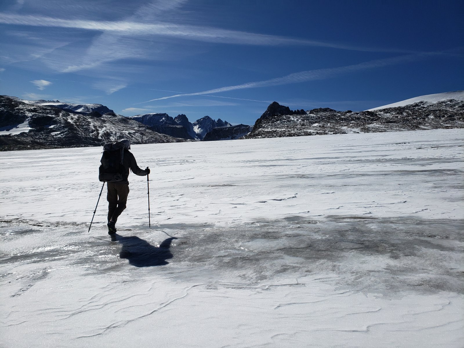 My hiking partner setting off across Grasshopper Glacier.