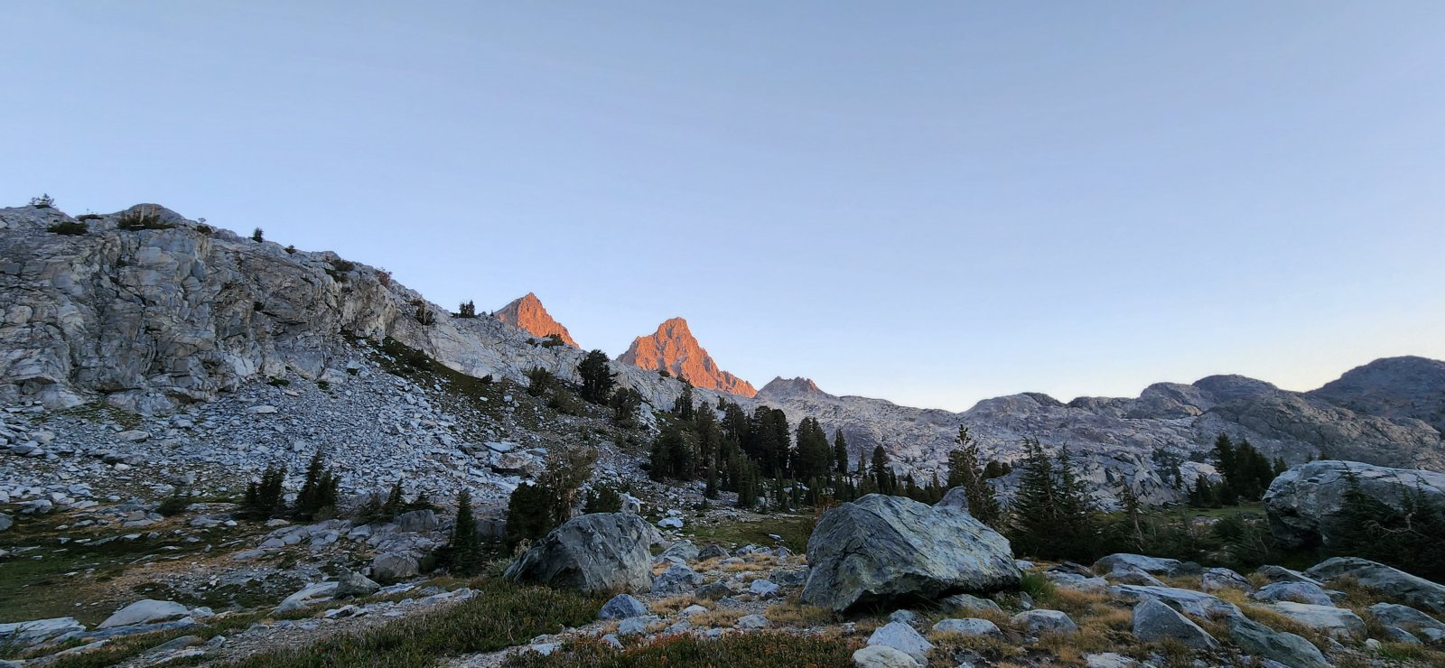An early look at Mount Ritter and Banner Peak from our camp at Iceberg 
Lake - we would spend much of our day circling these impressive peaks 
before crossing the NE ridge of Banner Peak at North Glacier Pass.