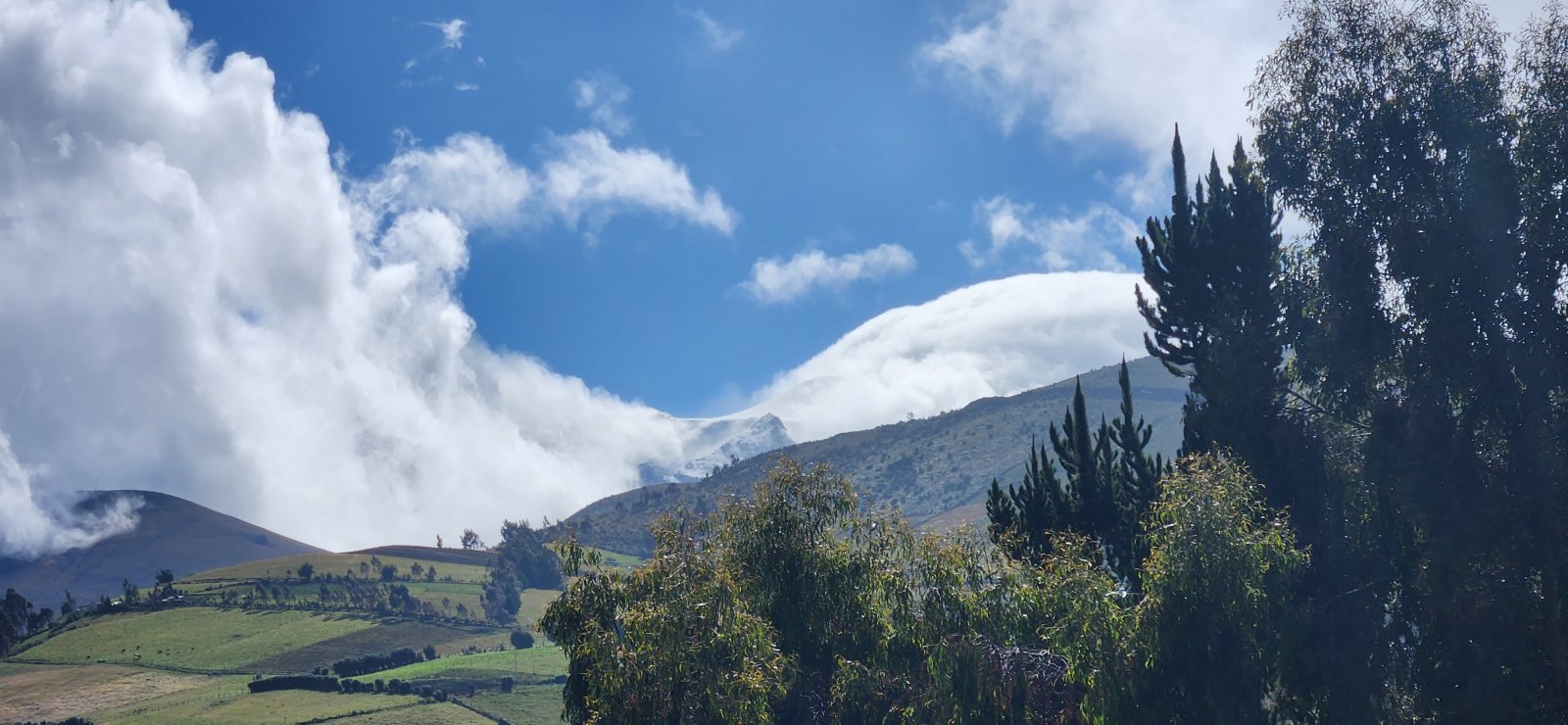 Fun facts about Cayambe:
It is the third highest mountain in Ecuador. The southern slope is the highest point in the world crossed by the equator. It is the only point on the equator with snow cover. First look at the mountain.
