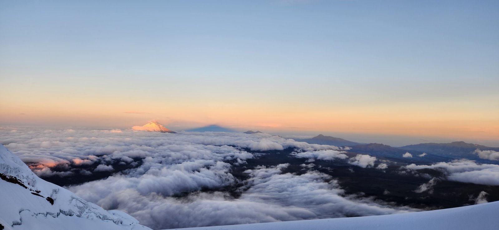 Antisana's shadow hanging out w/ Cotopaxi.