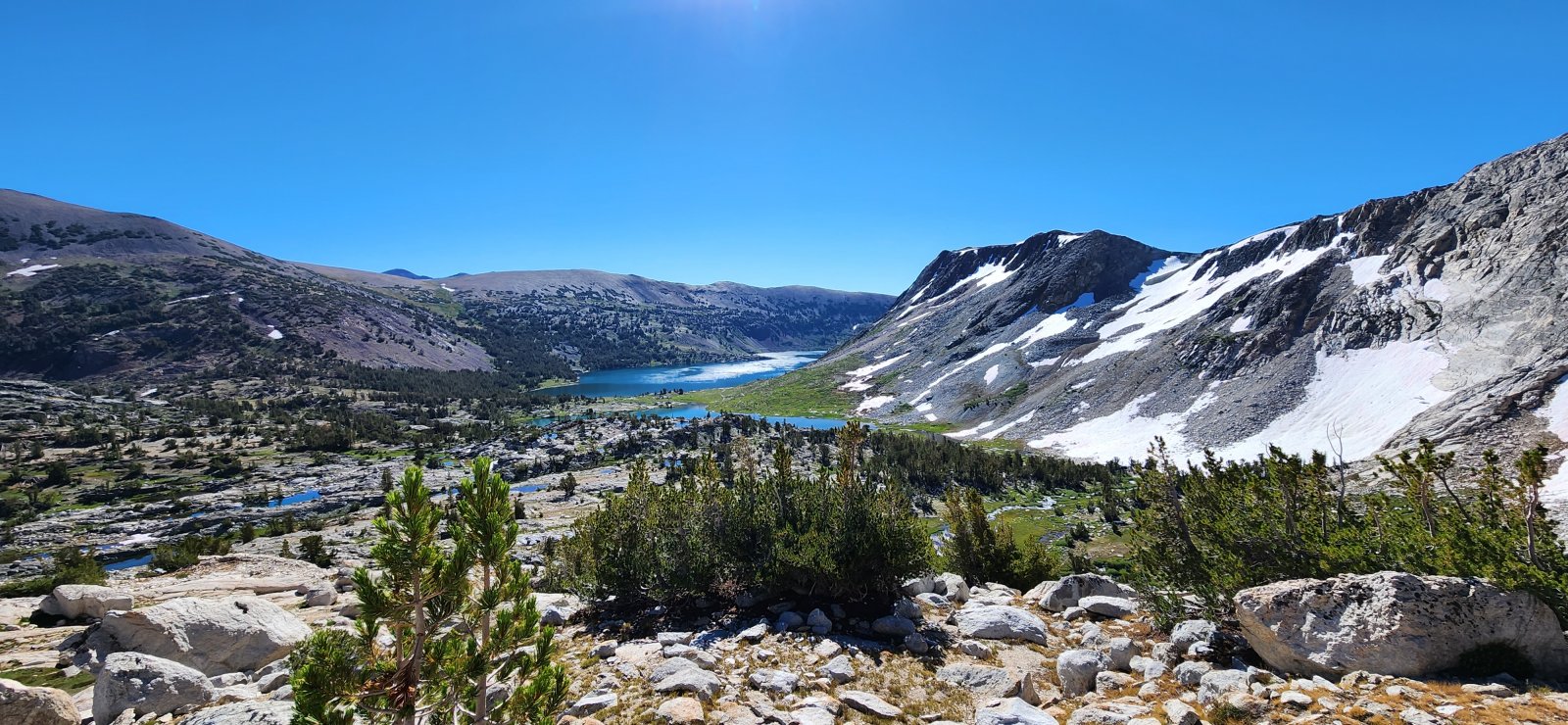 The very large Saddlebag Lake (reservoir) in the distance.