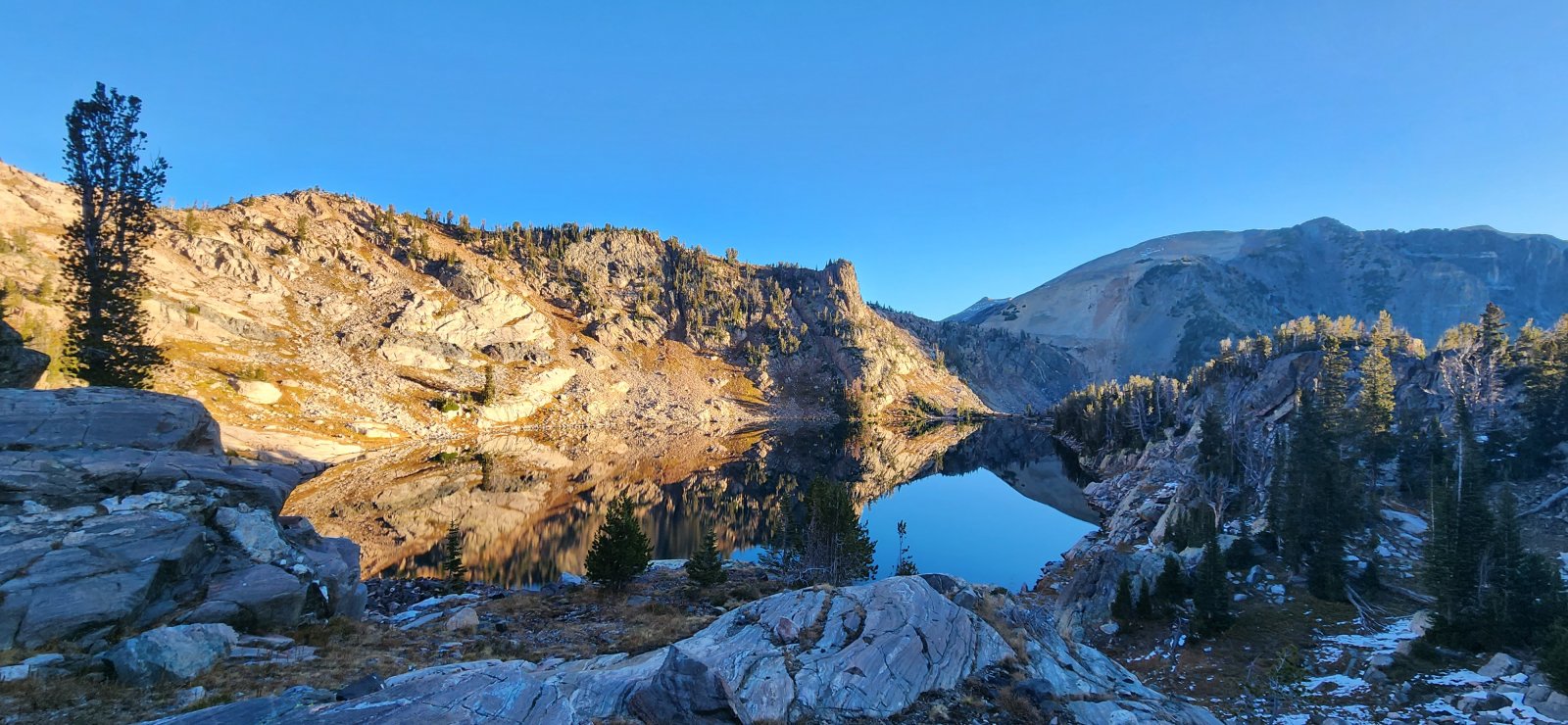 Reflections on Talus Lake as we depart.