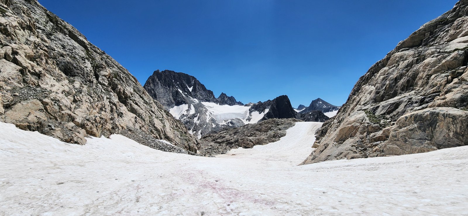 The lake in the distance does not appear on topographic maps and was 
revealed by recession of Minor Glacier. (So I guess we can call it Minor
 Lake?)