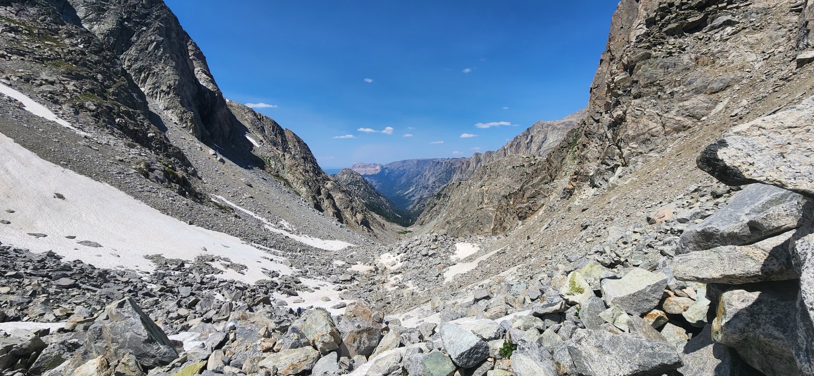 The north side was very slow going over very large boulders all the way 
up - the south side was a huge contrast, consisting of a long lush ramp 
all the way down to Elbow Lake.