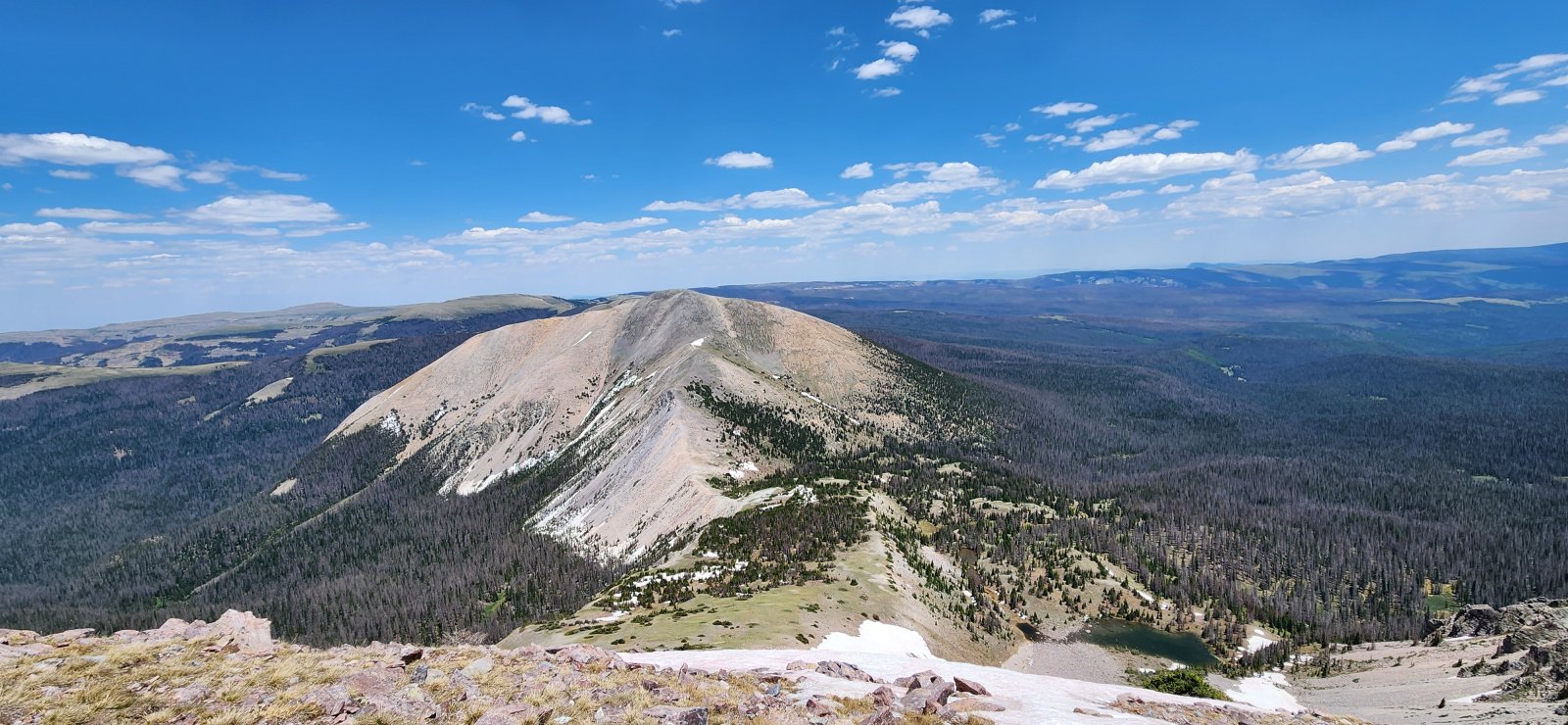 We weighed a few options for descending North Truchas Peak, but my 
desire to make a predictable and early exit on Day 3 pushed us towards 
dropping back to the pass from Day 1 and heading back out the way we 
entered.