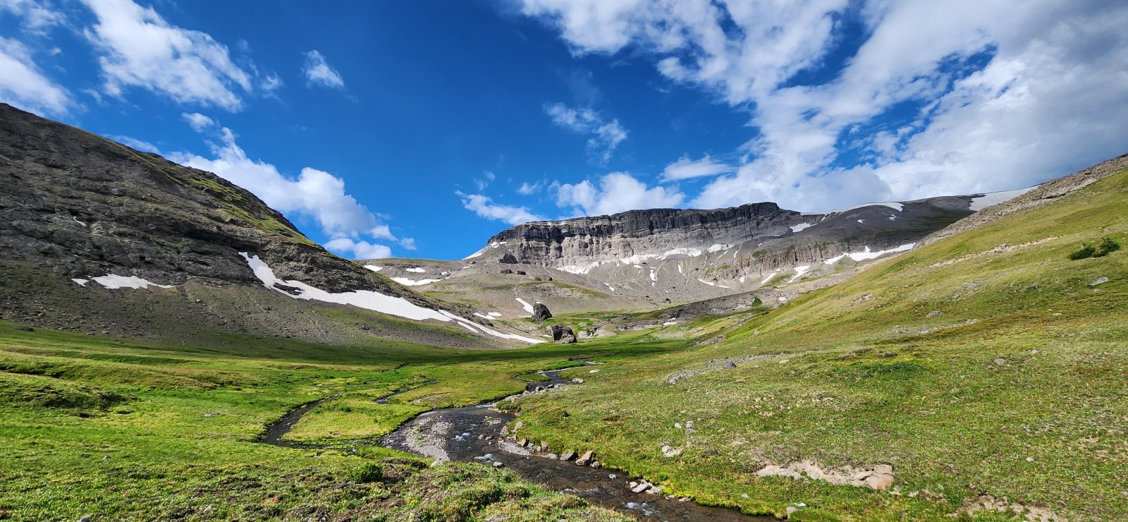 And on to the upper basin! This section was beautiful walking along a 
gentle stream, before climbing up towards unnamed Peak 11797 (or 11801, 
depending on the source).
