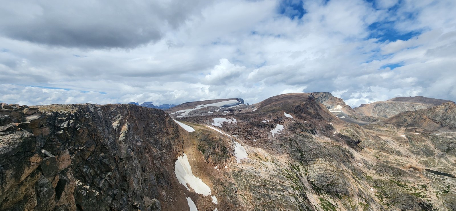 I was fascinated by the steep dropoffs on the northern side of the 
range, but found the lake basins on the south side to be the unique, 
more defining feature of the range.
