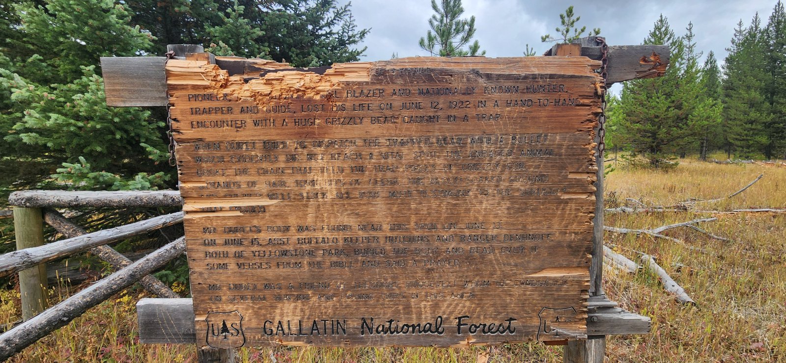 The 'interpretive sign' at Frenchy's Grave has seen better days. Interesting spot to visit.
