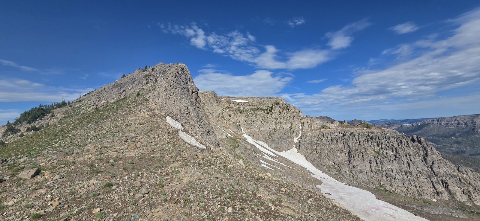 At one point I thought the wall to the right might go (it doesn't), then I thought I'd try the ridge on the left-center of the photo (it doesn't either).